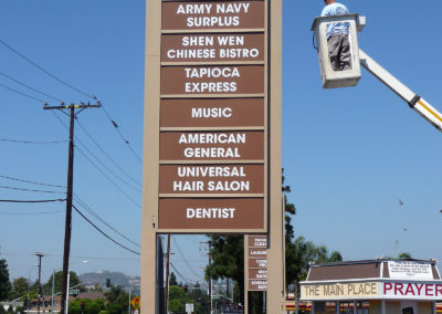 Installation of an outdoor pylon sign created with dimensional letters, by Amazing Signs - sign company.