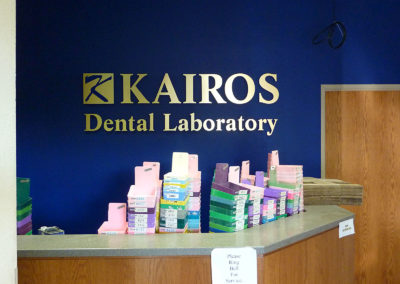 Custom Designed and Fabricated Interior Dimensional Wall Sign for Kairos Dental Laboratory