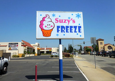 Custom pole sign, for Suzy's Freeze by Amazing Signs - sign company.