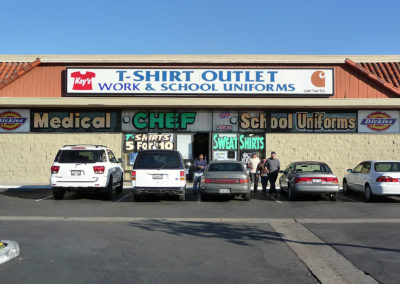 Storefront sign for T-Shirt Outlet, by Amazing Signs.