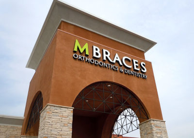 Custom Illuminated Channel Letter Sign - M Braces